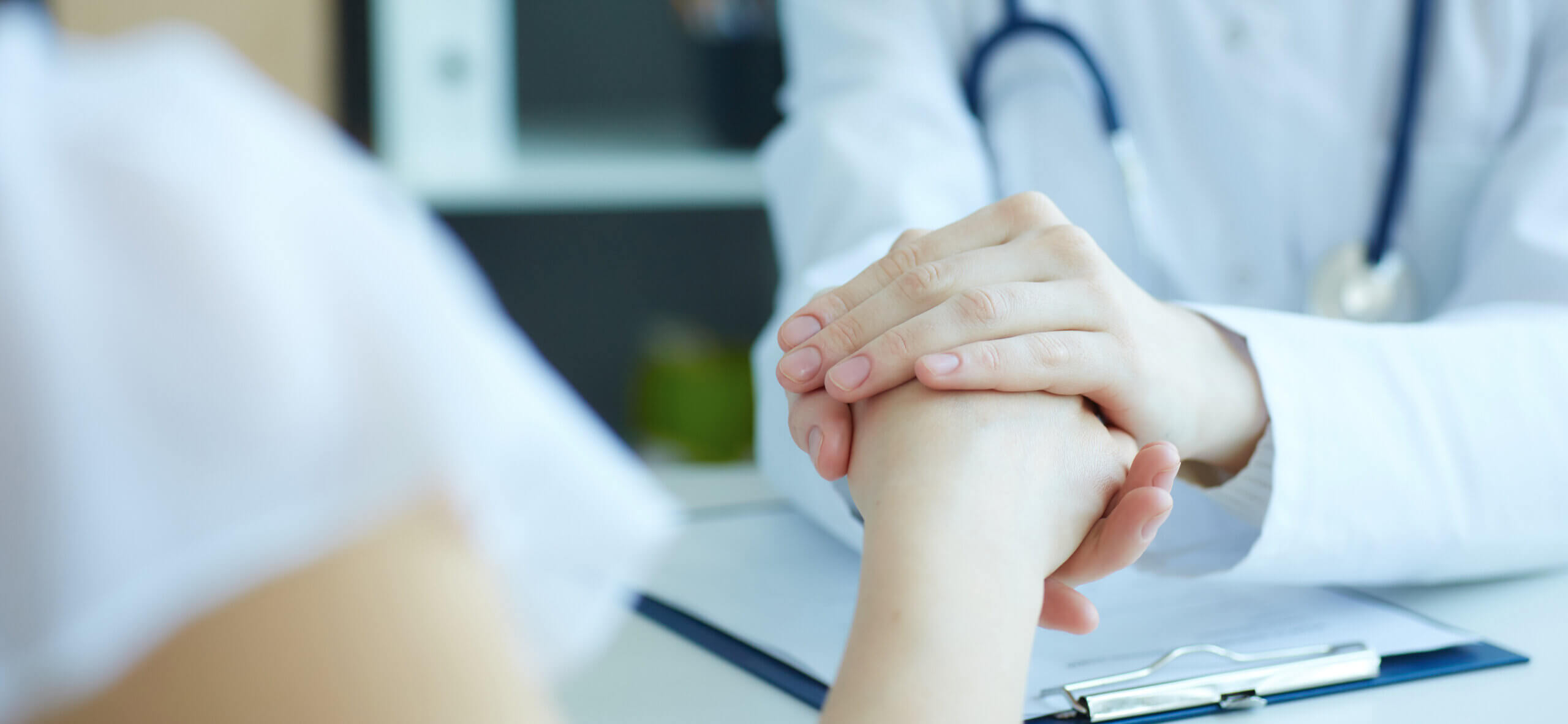doctor comforting patient