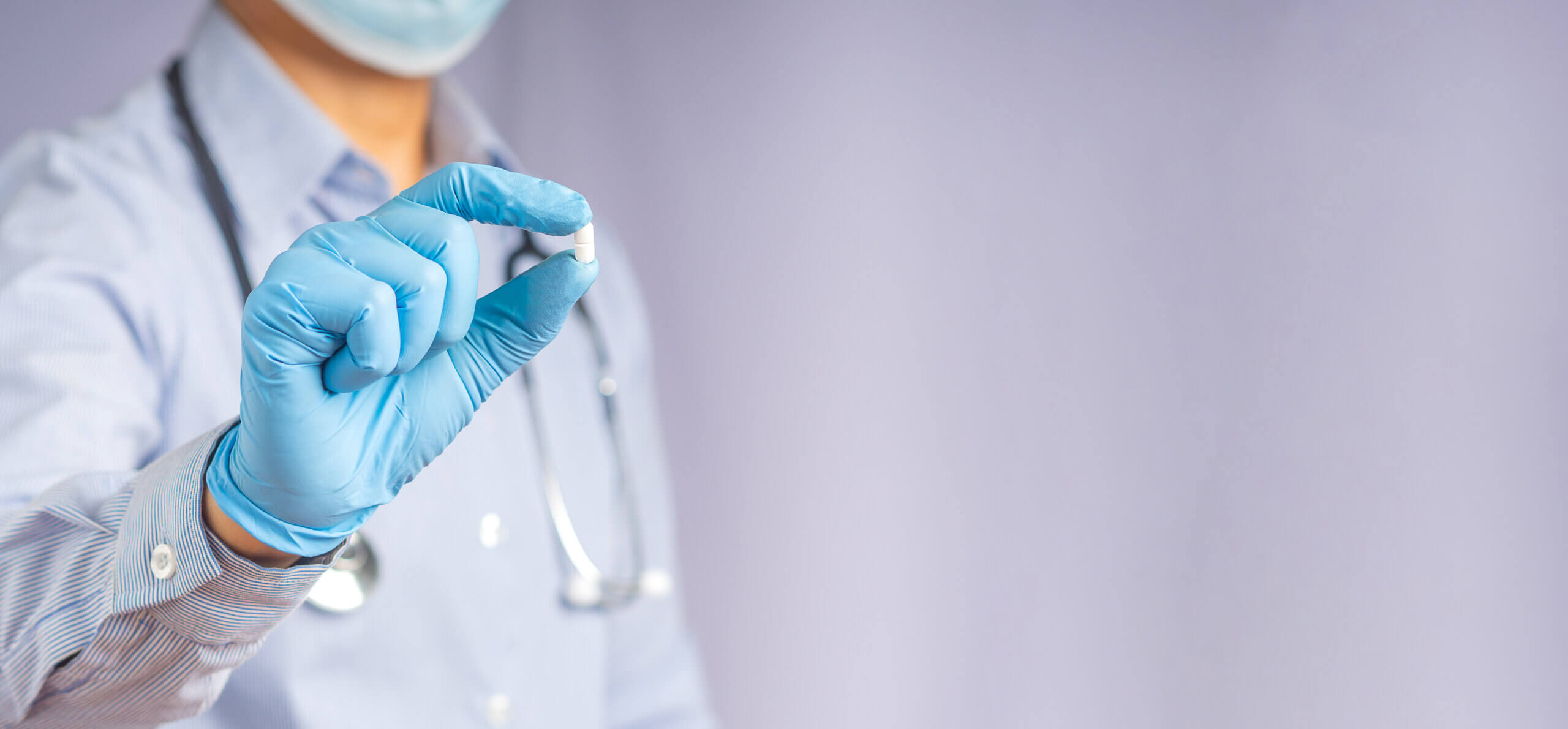 doctor holding aspiring