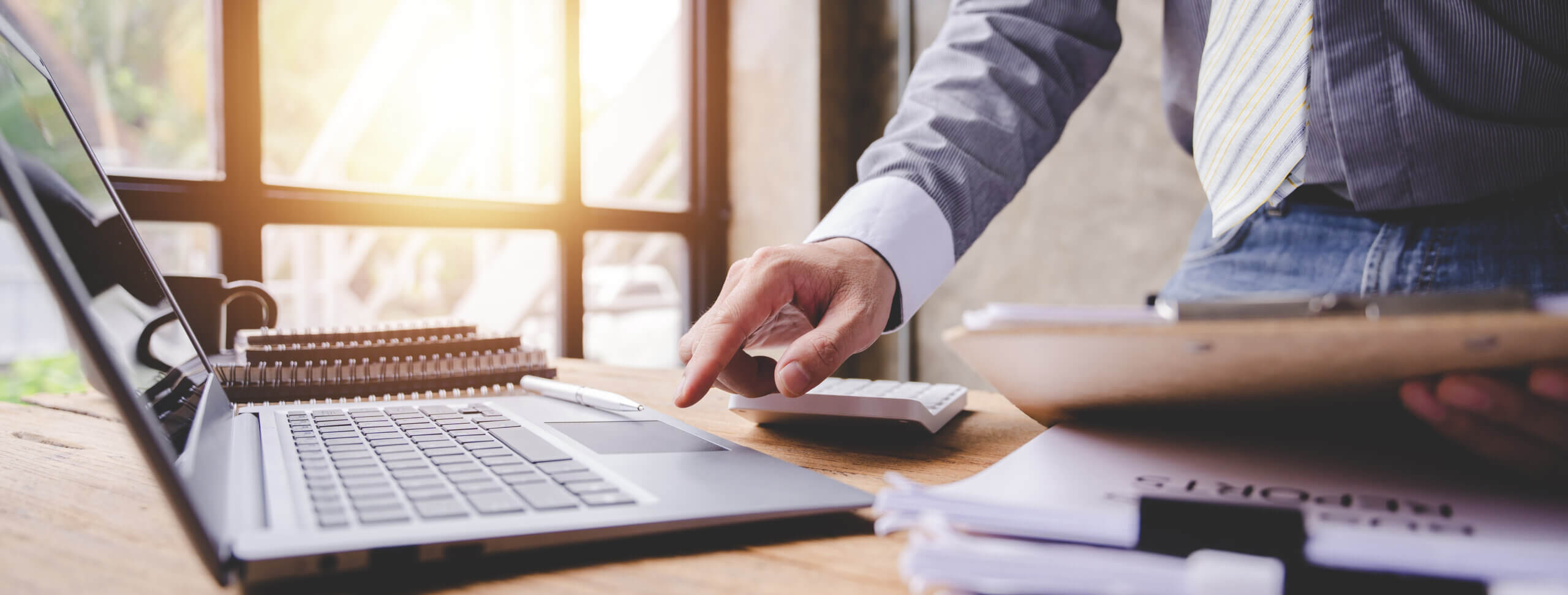 Businessman working at desk.