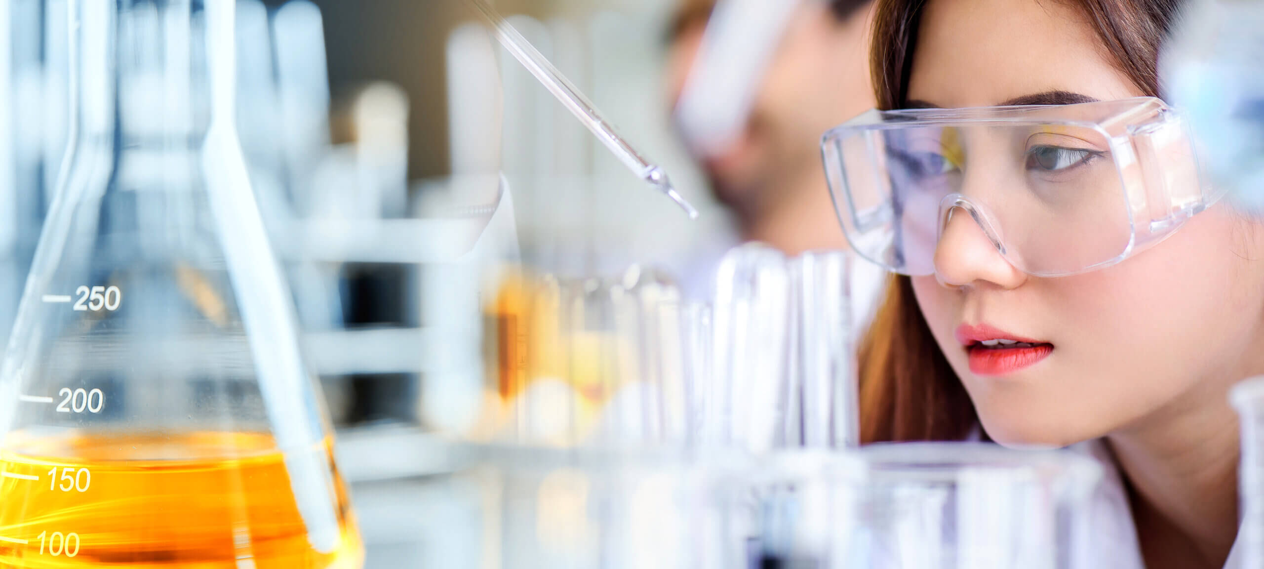 Female scientist researching disease