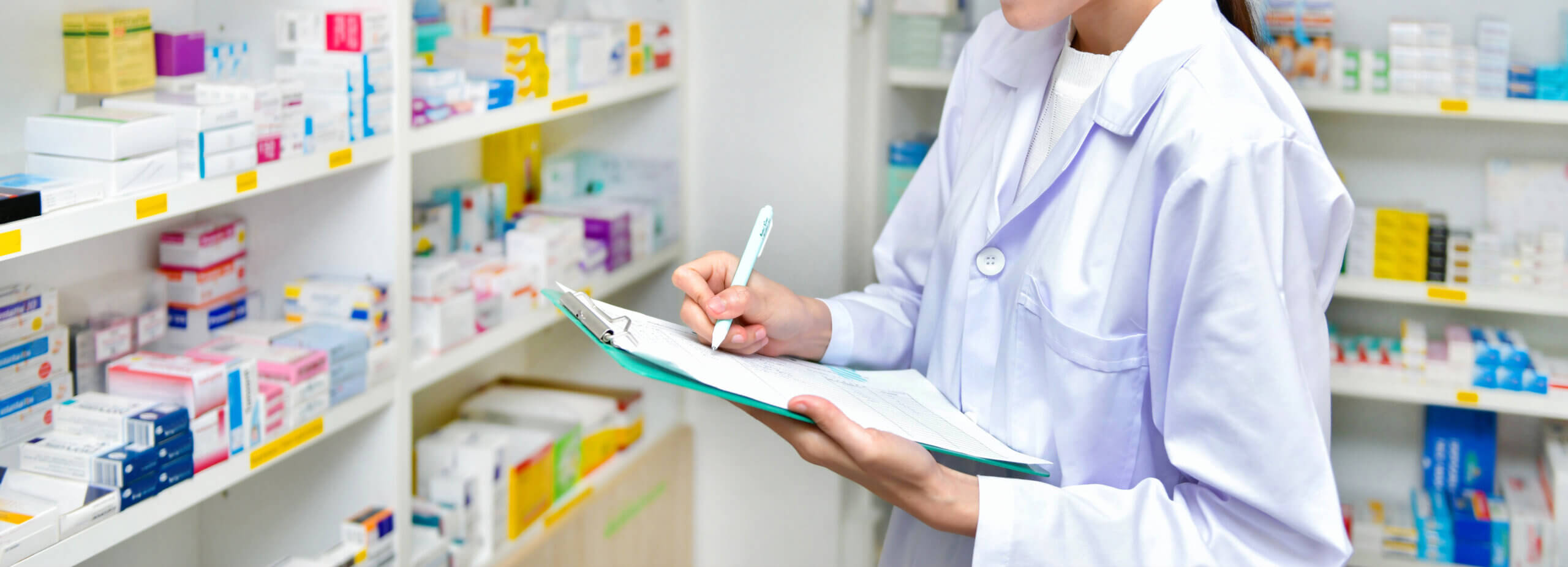 Pharmacist filling prescription.