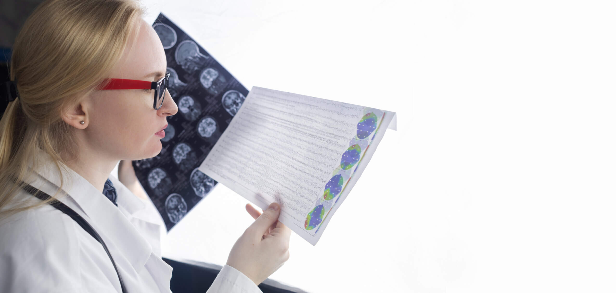 Neurologist reviewing brain scans.